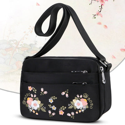 Sac à bandoulière imperméable avec fleur brodée