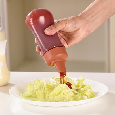 Bouteille à presser perforée pour condiments