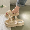 Sommerliche vielseitige modische Sandalen mit Schleife