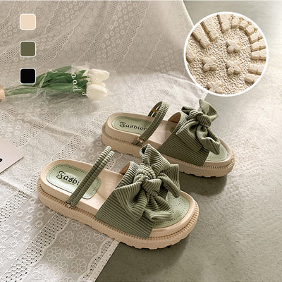 Sommerliche vielseitige modische Sandalen mit Schleife